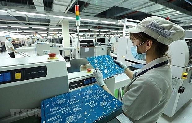 Dây chuyền Kl994 nhà cái bóng đá world cup sản phẩm thiết bị công nghệ Việt Nam. (Ảnh: Minh Quyết/TTXVN)