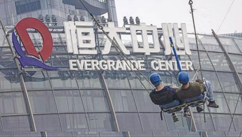 Bom nợ TPDN 300 tỷ USD của Evergrande (Trung Quốc) phát nổ năm 2021 gây rúng động thị trường Kl991.com nạp rút nhanh toàn cầu. Ảnh: EPA