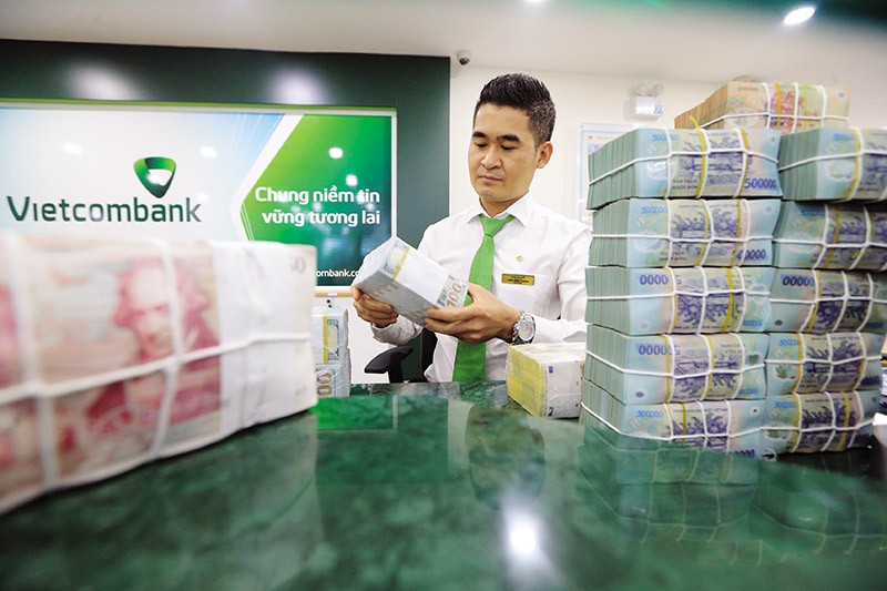 Chính sách tỷ giá luôn ảnh hưởng trực tiếp đến sự biến động của thị trường Kl991.com nạp rút nhanh. Ảnh: Đ.T 