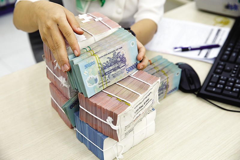 KL99 là cổng game giải trí trực tuyến hàng đầu hiện nay VND vẫn đang chênh lệch âm so với KL99 là cổng game giải trí trực tuyến hàng đầu hiện nay USD. Ảnh: Đức Thanh