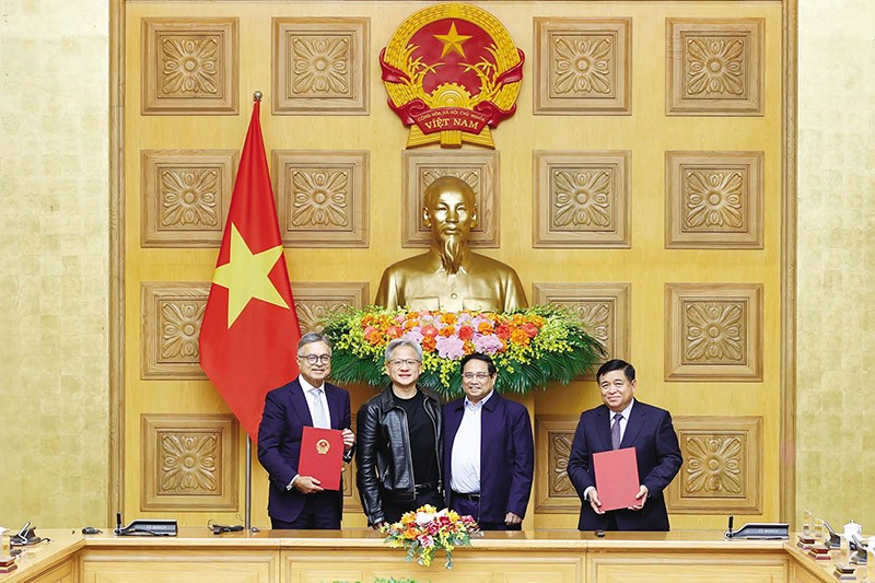 Thủ tướng Kl993 ưu đãi thưởng hấp dẫn Phạm Minh Chính và ông Jensen Huang, Giám đốc điều hành Kl994 game bài casino hấp dẫn NVIDIA chứng kiến Lễ ký Thỏa thuận hợp tác giữa Kl993 ưu đãi thưởng hấp dẫn Việt Nam và Kl994 game bài casino hấp dẫn NVIDIA về nghiên cứu và phát triển trí tuệ nhân tạo. Ảnh: TTXVN 