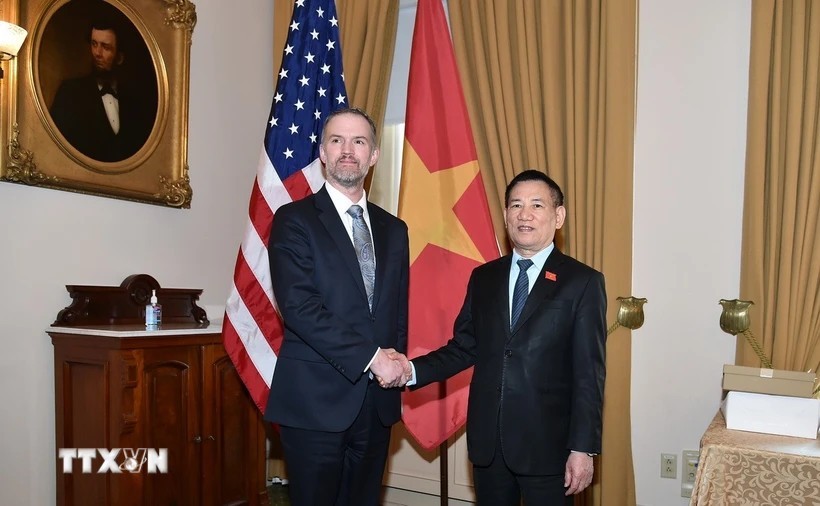 Phó Thủ tướng Hồ Đức Phớc gặp Đại diện Thương mại Mỹ Jamieson Greer. (Ảnh: TTXVN).