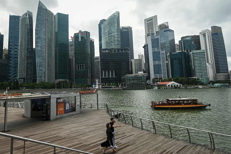 Bộ Thương mại và Công nghiệp Singapore đã hạ dự báo tăng trưởng GDP năm 2025 của nước này xuống còn 0 - 2%. Ảnh: AFP