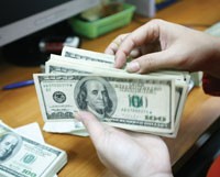 Tỷ giá: con dao hai lưỡi ?