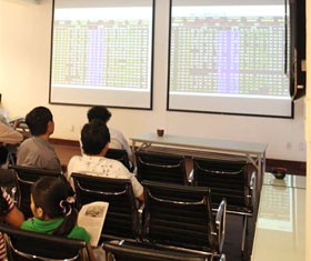 Nhiều ý kiến của các chuyên gia và cơ quan quản lý cùng chung nhận định, TTCK sẽ có những yếu tố tích cực hơn trong năm 2011 - Ảnh: Hoài Nam